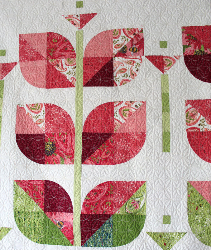 Beanstalk quilt by Robin Pickens in Painted Meadow fabric from Moda Fabrics, Sand dollar pantograph
