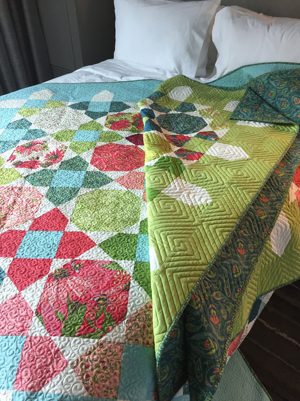 Picket quilt by Robin Pickens with Painted Meadow for Moda Fabrics- on bed