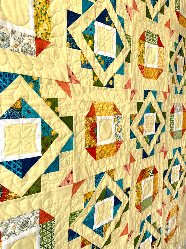 Fair and Square quilting for Solana by Robin Pickens
