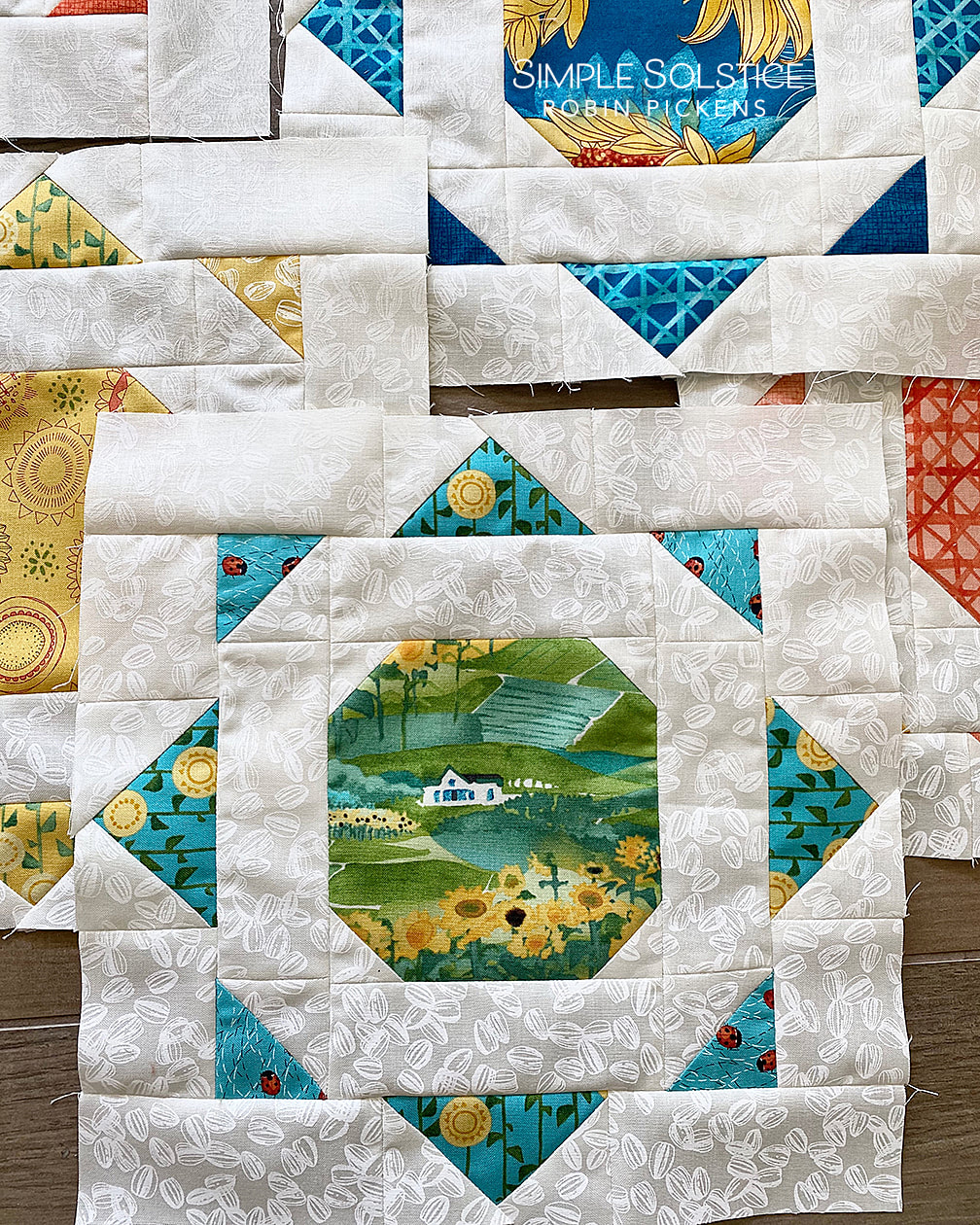 Simple Solstice quilt blocks use HST, flying geese and stitch and flip.