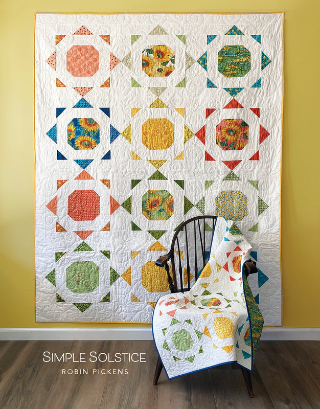 Simple Solstice quilt pattern by Robin Pickens with Solana fabric
