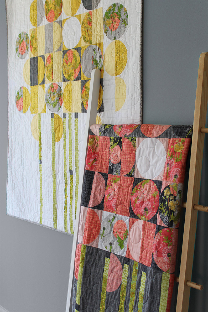 Towards the Sun quilts by Robin Pickens in two colorways