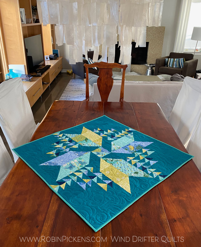 Wind Drifter quilt as table topper Robin Pickens