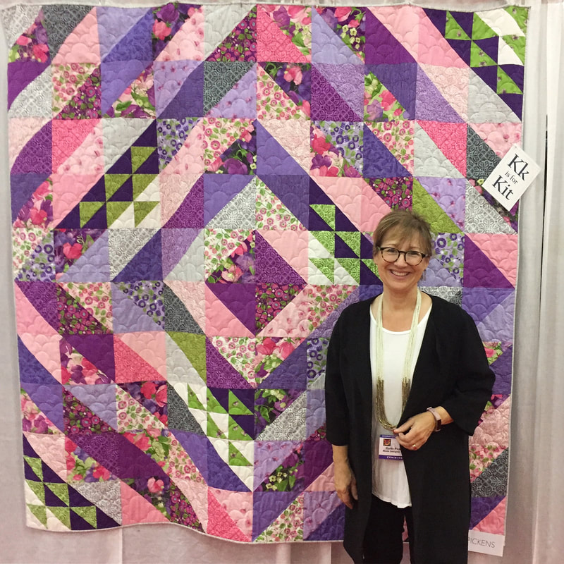 Faceted quilt by Robin Pickens with Sweet Pea and Lily Moda fabric