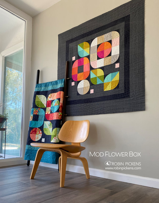 Mod Flower Box quilt in foyer from Robin Pickens