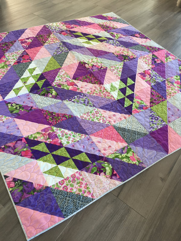 Faceted quilt by Robin Pickens with Sweet Pea and Lily Moda fabric