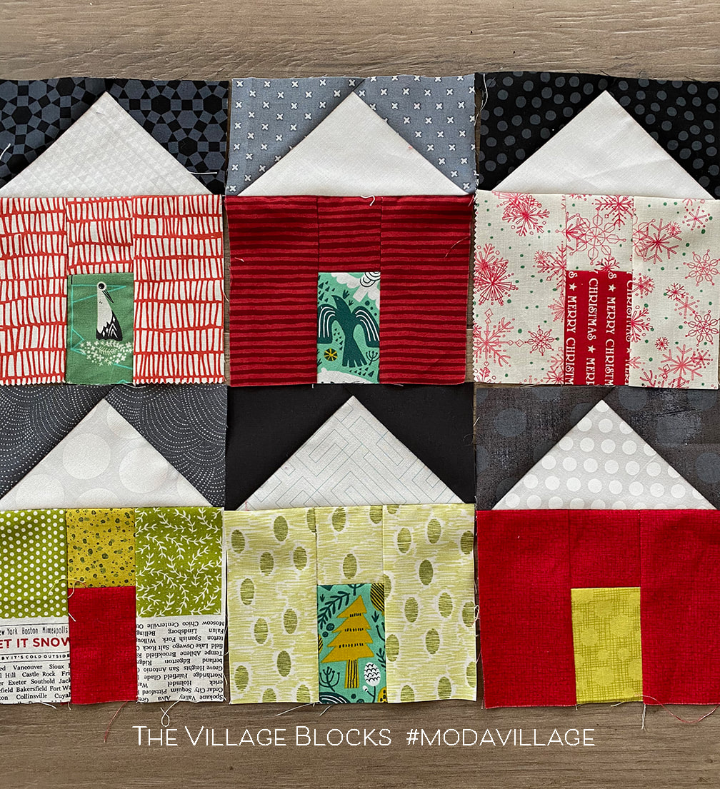 The Village quilt in Christmas fabrics #modavillage